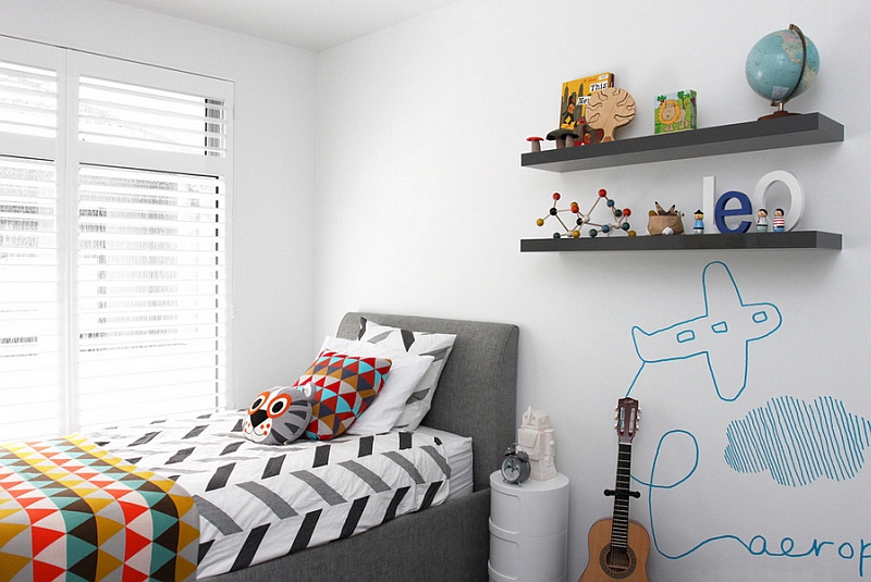 Sleek floating shelves and bed for the kids' room