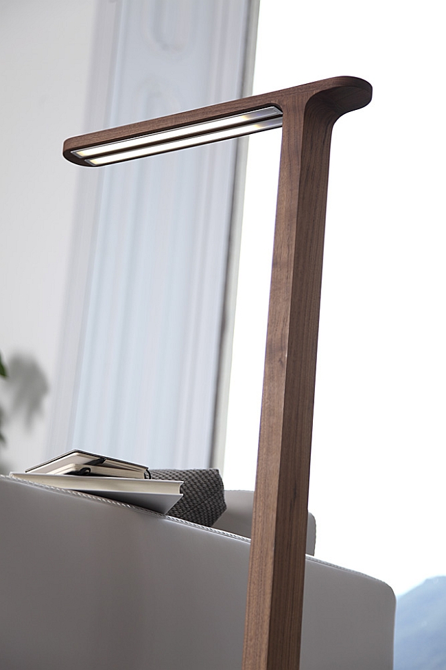 Slim canaletta walnut body of the futuristic floor lamp