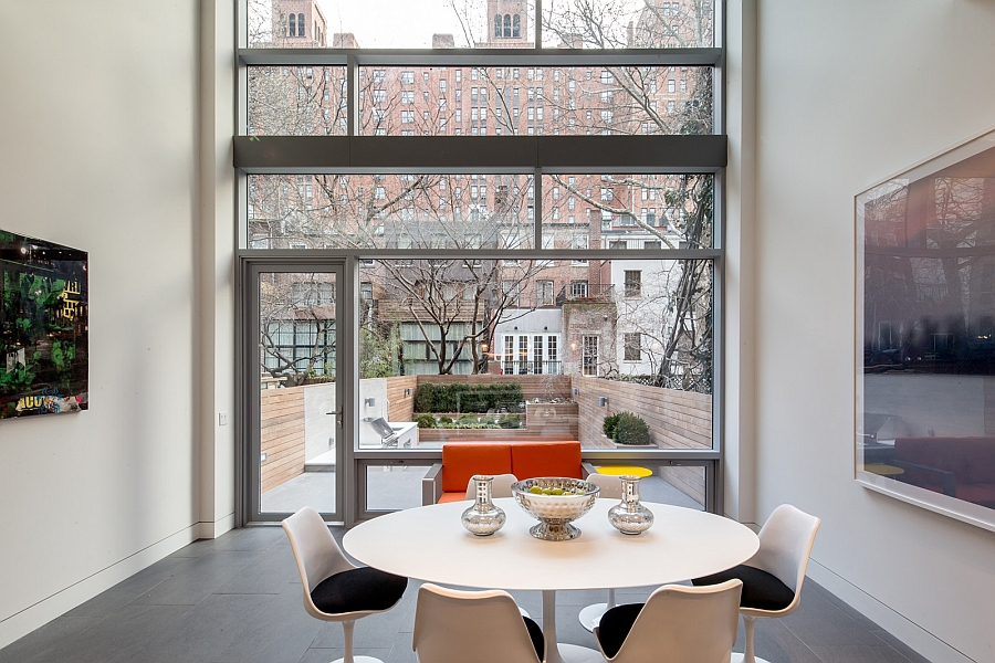 Small dining area on the lower level connected with the backyard