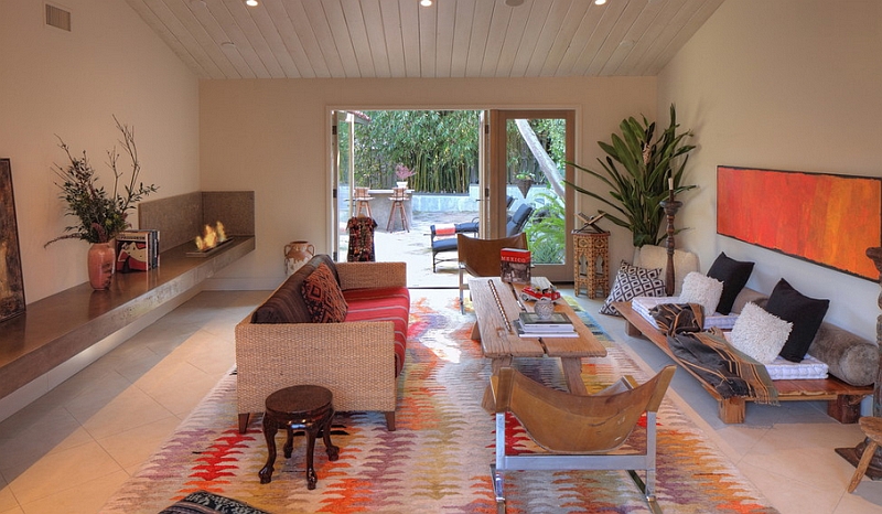 Smart living area with a colorful rug, plush textures and a Bohemian-Mediterranean style