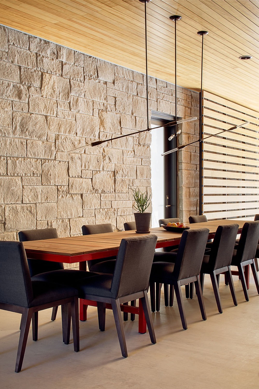 Spacious dining area with ample natural ventilation and lovely pendant lighting