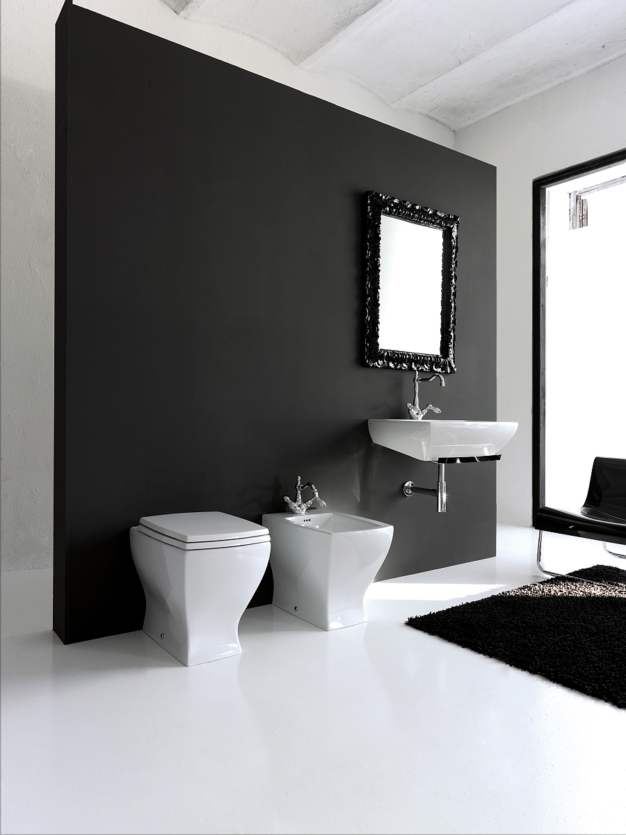 Trendy black and white bathroom with sanitaryware that complements the look