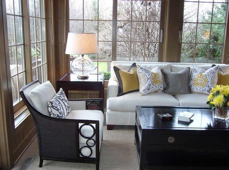 Use throw pillows to bring in the gray and yellow color scheme