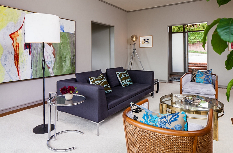 Vintage tripod lamp in the corner enlivens the tropical themed living room