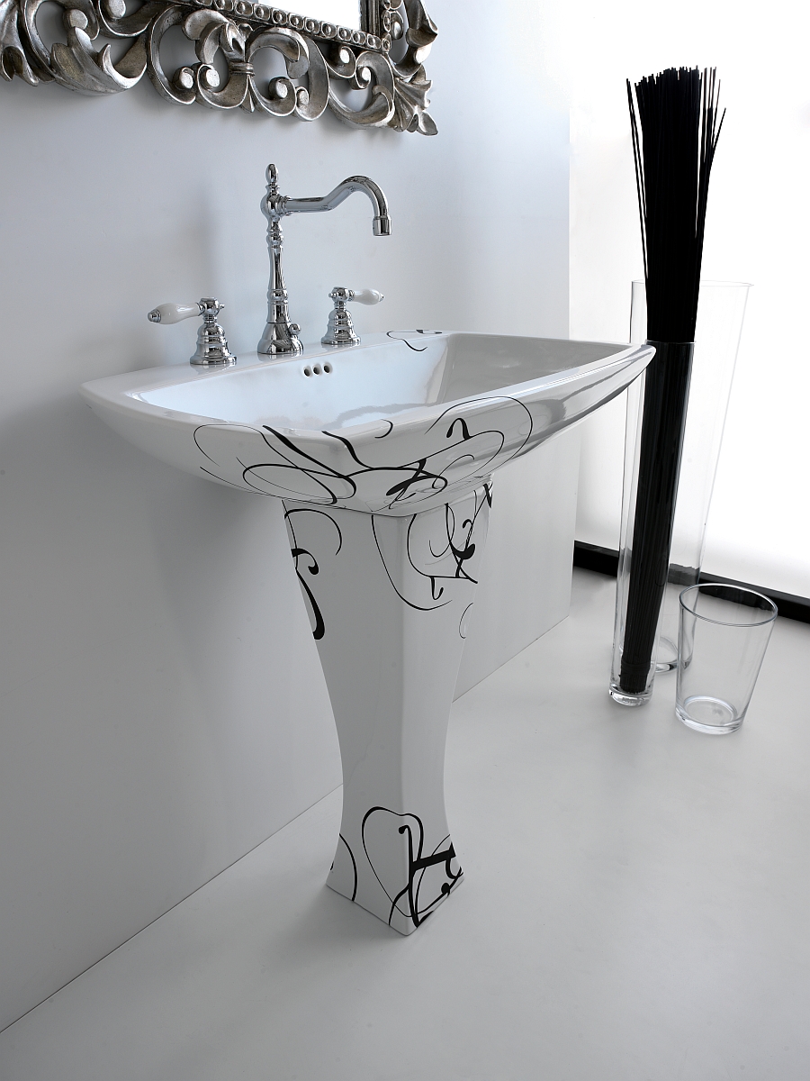 White washbasin with intricate pattern in black and a classic design