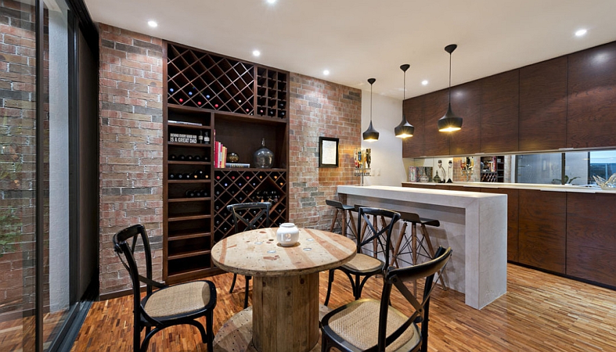 Wine storage in the kitchen adds visual contrast to the space