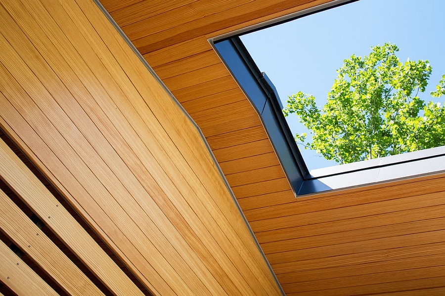 Wooden ceiling with skylights lets in ample ventilation