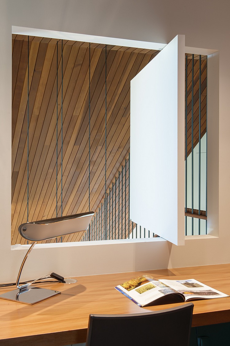 Work desk on the top floor with a view of the lower level