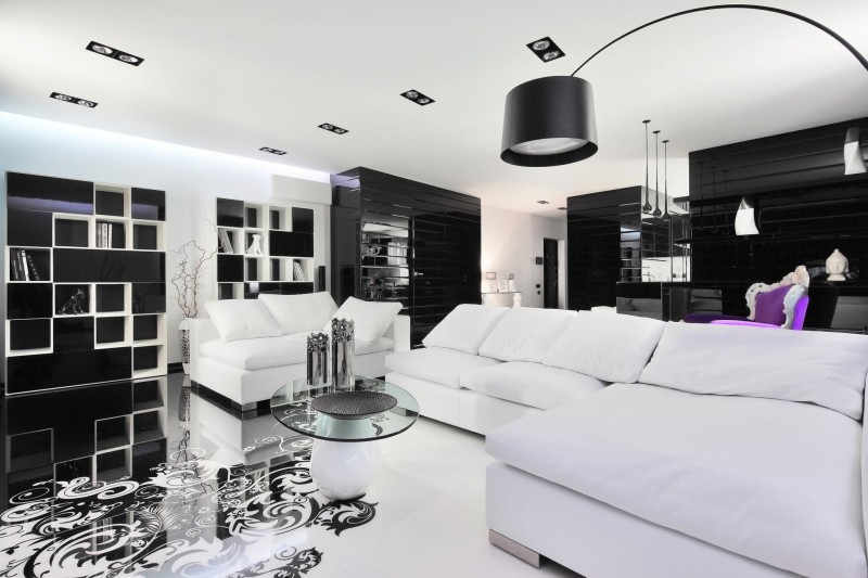 Amazing black and white living room with lone purple chair in the backdrop