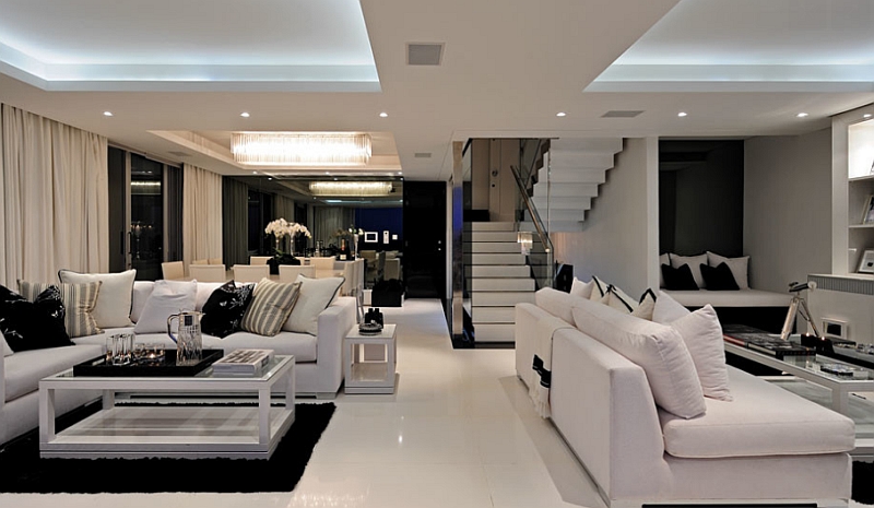 An open floor living area with black and white color scheme