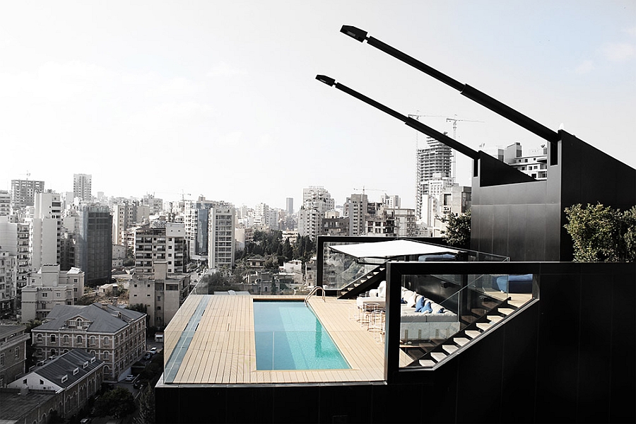Awe-inspiring bachelor pad with a top level pool and amazing city skyline views