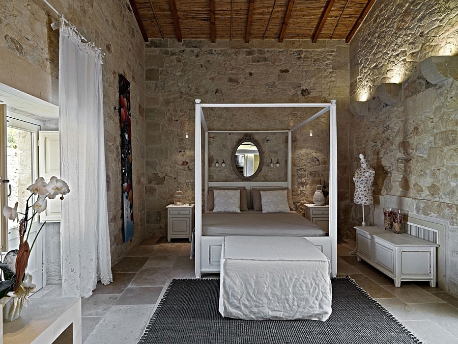 Beautiful four-poster bed brings modern comfort to the historical room