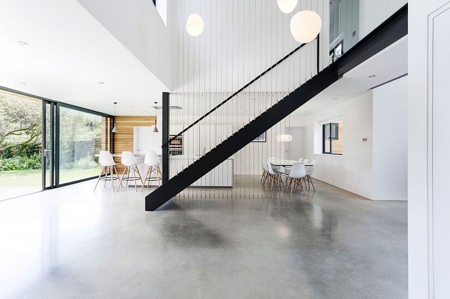 Beautiful metal staircase adds sculptural value to the interior