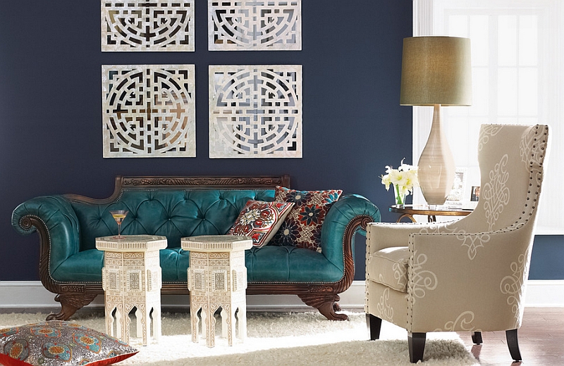 Beautiful teal chaise lounge placed in a living room with navy blue walls - 5 Designs Of Accent Chairs For Your Living Room