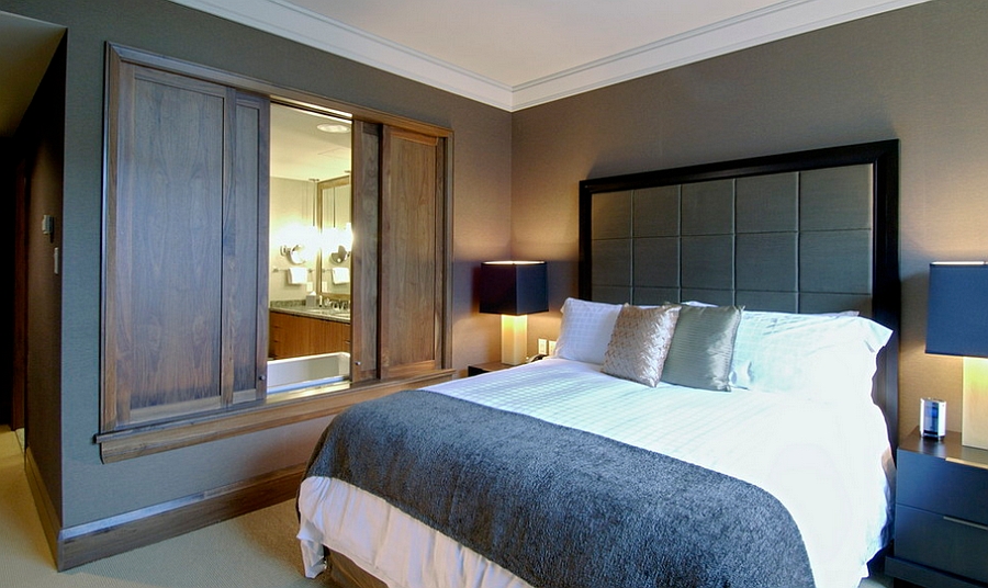 Bold bedside lamps enhance the distinct appeal of the relaxed bedroom