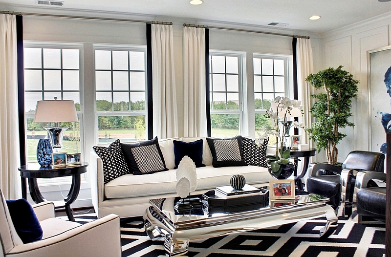 Simple Black And White Decor Ideas For Home   Bold Pattern Of The Rug And The Throw Pillows Drive Home The Black And White Color Palette 