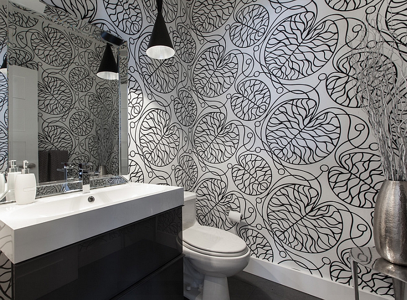 Bold wallpaper from Marimekko adds stunning appeal to the black and white bathroom