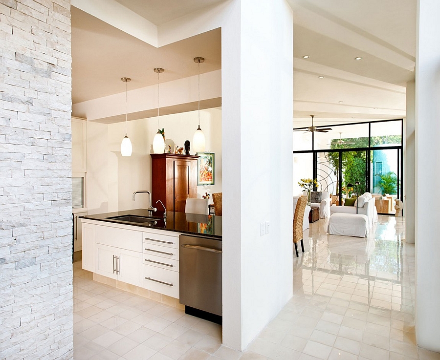 Brick wall backdrop of the contemporary kitchen