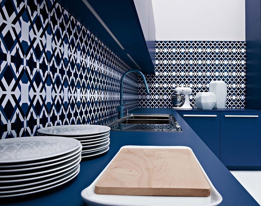 Colorful and posh backsplash in blue along with a countertop that compliments it