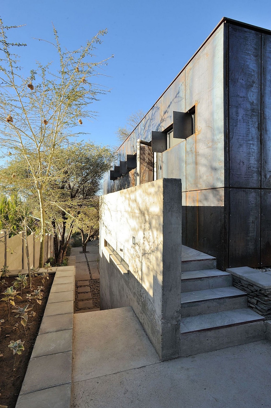 Concrete blocks were repurposed and used to shape the entrance