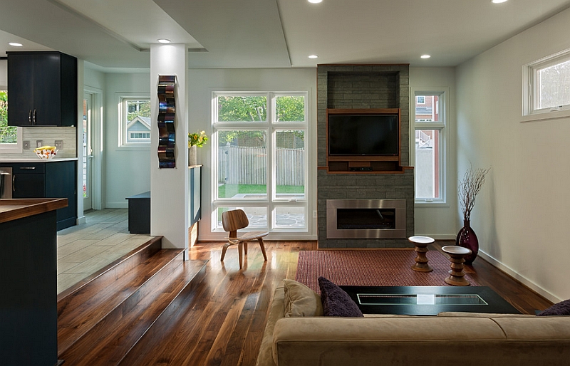 Contemporary sunken living room with a couple of Eames delights