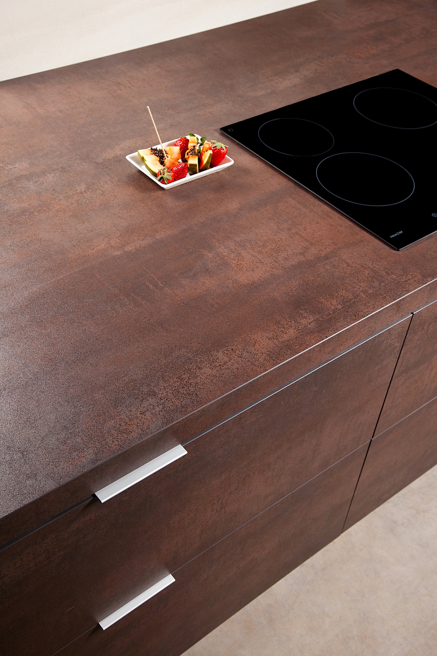 Copper finish from the Neolith Iron Collection brings unique texture to the kitchen
