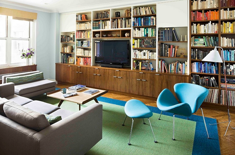 Create a cozy reading nook in the living with iconic Orange Slice Chair [Design: Laurie Lieberman Architects]