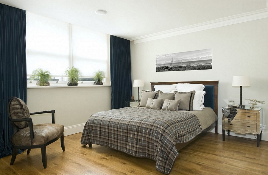 Dark blue and light gray are ever-popular choices in bedrooms with a masculine vibe