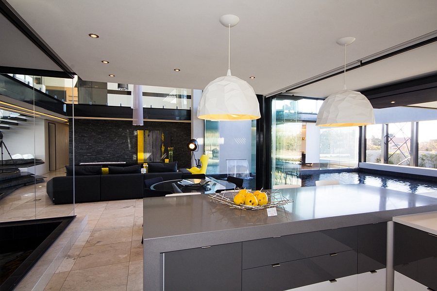 Elegant ROCK pendant lights above the kitchen island