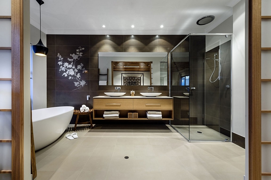 Elegant and amazing bath with a dark backdrop and a standalone bathtub in white