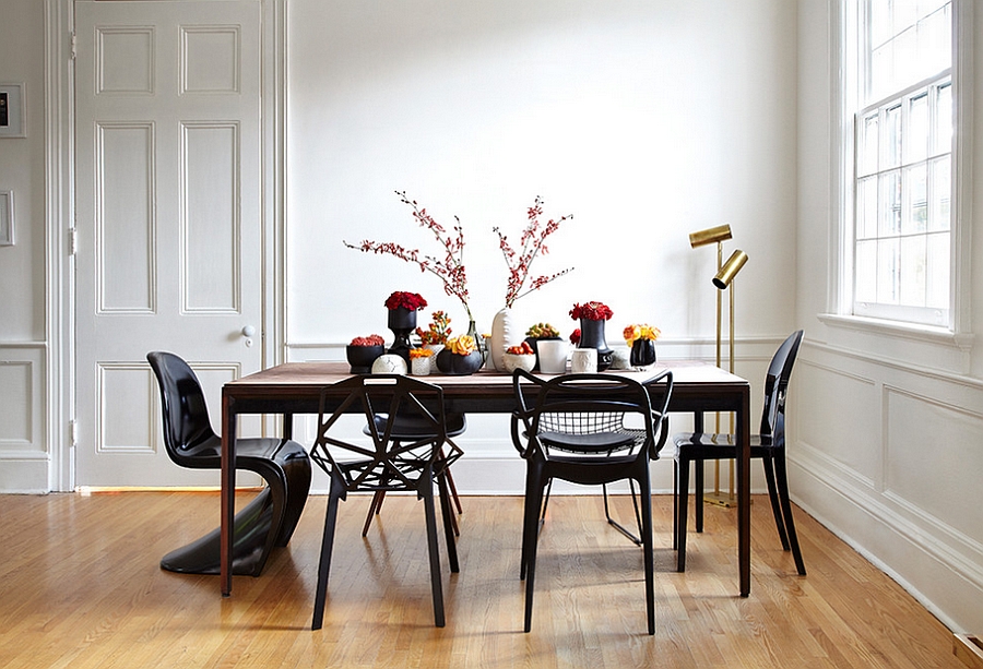 Exquisite blend of sculptural chairs at the dining table