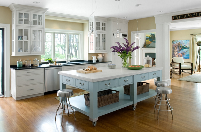 Exquisite kitchen island on casters in beautiful blue and white with ample storage