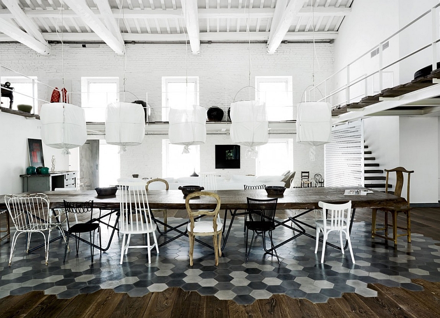 Exquisite use of tiles to demarcate the dining area in an open floor plan