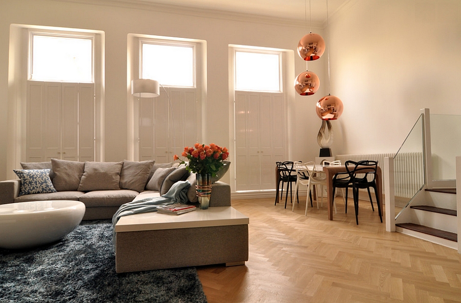 Fabulous living room with sculptural lighting and dining table chairs