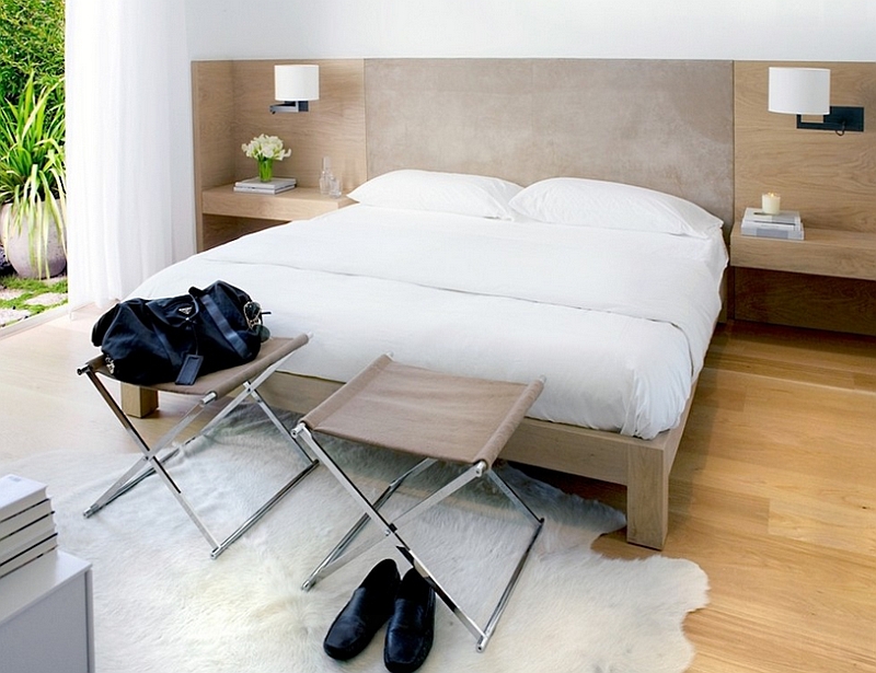 Footstools give the bedroom a distinct masculine touch