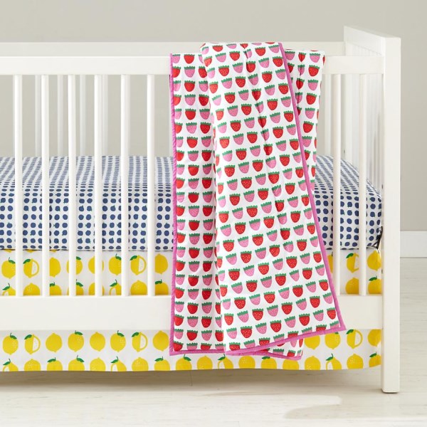 Fruit-motif baby bedding from The Land of Nod