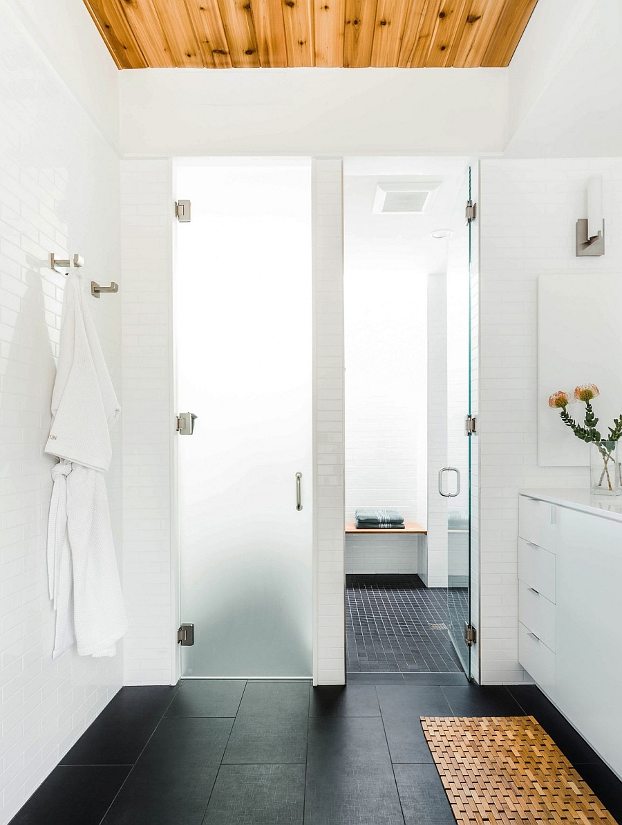 Gorgeous modern bath with a glass shower enclosure and a compact home steam room