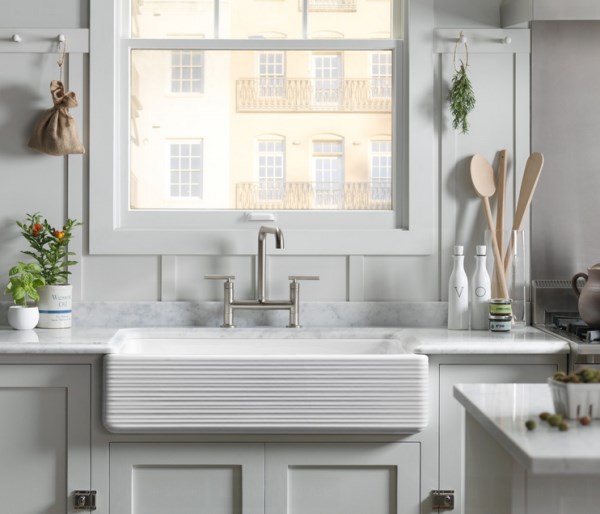 Herbs and oils in a bright kitchen