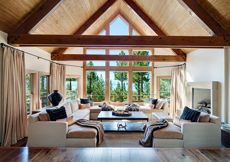 High vaulted ceiling makes the sunken living space seem even more dramatic