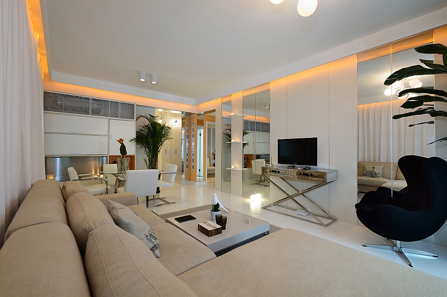 Iconic decor and a neutral color palette in the living room of the Shanghai apartment