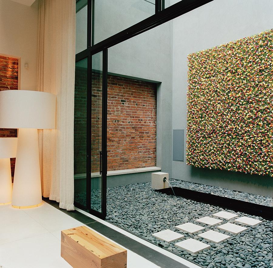 Indoor courtyard with skylights above ushers in natural ventilation