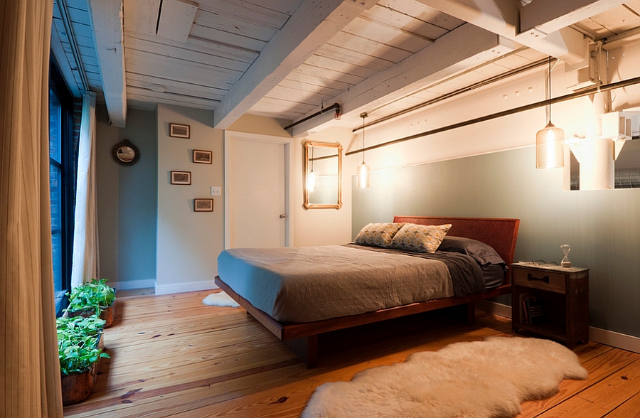 Industrial style masculine bedroom with a cozy, inviting vibe