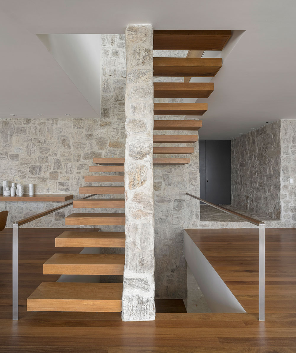 Interior in stone and wood offers a blend of contrasting textures