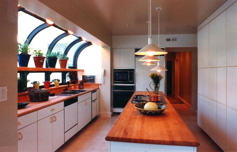 Kitchen with a greenhouse window