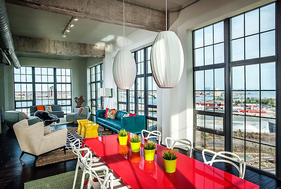 Lovely use of bold color and decor in the industrial dining room [Design: Lauren M. Levine Interiors]