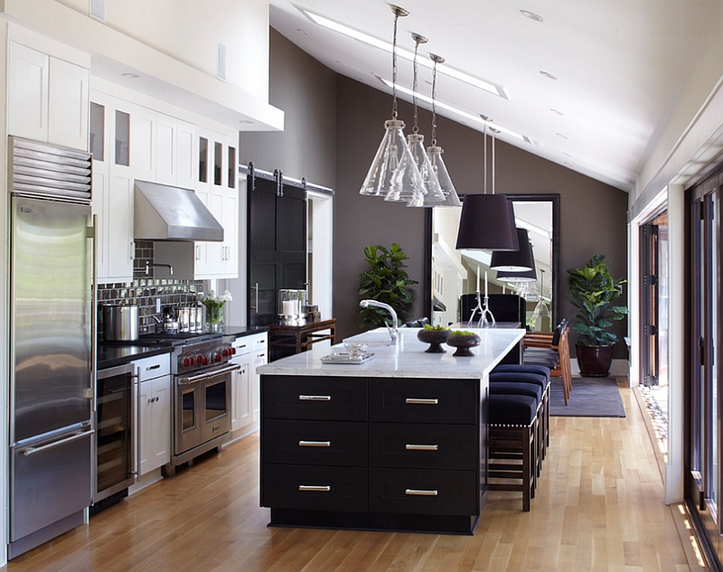 Lovely use of gray in the kitchen along with the black cabinets