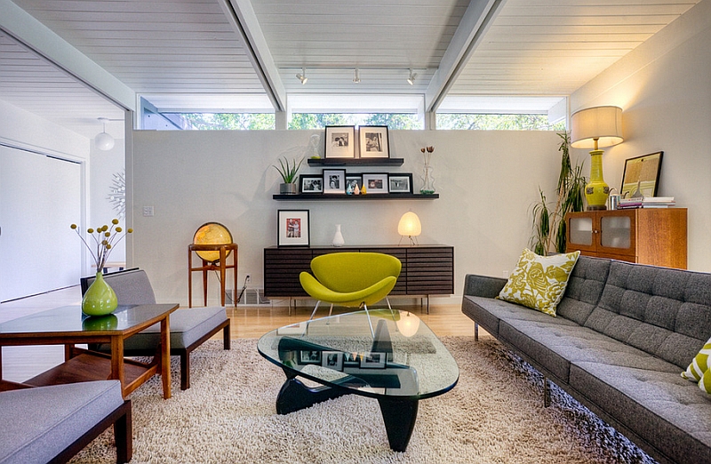 Low ceiling living room with a window at the top and iconic Mid-Century Modern decor