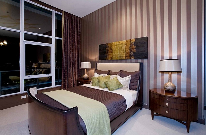 Luxurious bedroom brings together deep eggplant and light green in a subtle fashion