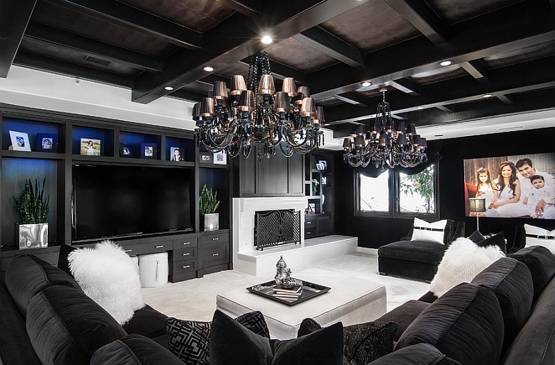 Luxurious contemporary family room in black and white looks truly stunning!