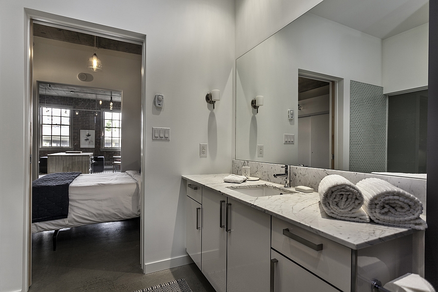 Master bedroom unit in white with a stylish bath